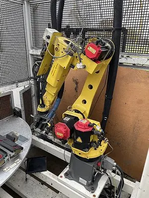 Used 2008 FANUC M10IA DUAL ARM ROBOTIC FOAM CELL WITH A/B SIDED INDEX TABE/ COULD CONVERT TO WELD CELL Robotic Welding Cells | Harbor Machinery Inc. #1283347