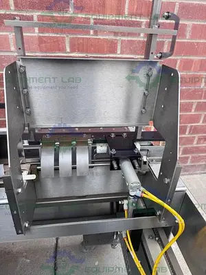 USED ECONOSEAL E SYSTEM 2000 ECONOSEAL CARTONER W/  HOT GLUE SEALING