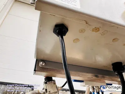 USED 2010 LIQUID PACKAGING 310-150 TT OVERFLOW FILLER