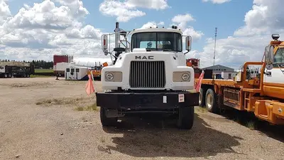 USED 1980 MACK DM600 TWIN STEER HEAVY DUTY OILFIELD PUMP / KILL TRUCK