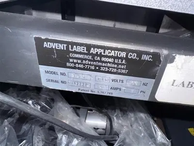 Advent model 310 semi-automatic pressure sensitive wraparound labeler