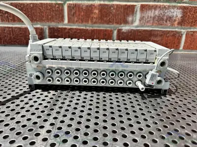 Used LOT OF 12 - SMC VQ2100-5 SOLENOID VALVE MANIFOLD 0.1-0.7 MPA Electronics & Components California US | Equipment Lab #1271595