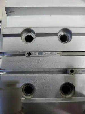 SMC MGPM2525Z Double Pneumatic Cylinder w/DM9P Reed Switches. 6E2