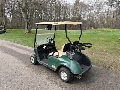 (1) 2015 E-Z-Go golf cart with a Kawasaki gas engine, does not include Club canopy, includes ball wa...