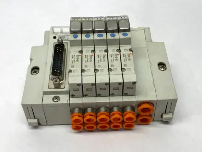 USED SMC PNEUMATIC MANIFOLD ASSEMBLY 1/4" PORTS 24VDC DAMAGED