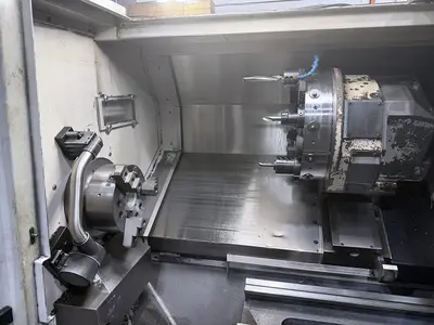 USED 2013 OKUMA L300E-M