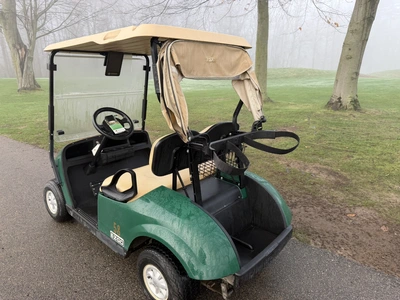 (1) 2017 E-Z-Go golf cart with a Kawasaki gas engine, model 625111G01, includes canopy, ball cover, ...