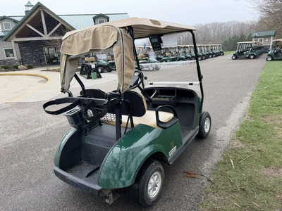 (1) 2015 E-Z-Go golf cart with a Kawasaki gas engine, includes ball washer and Club canopy, ball cov...