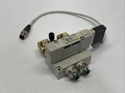 SV3100-5W1U-03N | SMC  Pneumatic Solenoid Valve w/ Subplate 24VDC - Used