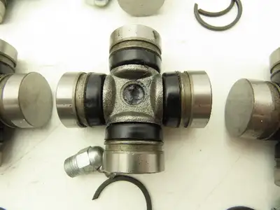 4-Groove U-Joint, 1.063" Cap Diameter, 2.5" OAL, 1.651" Inside Lock-up Lot of 7