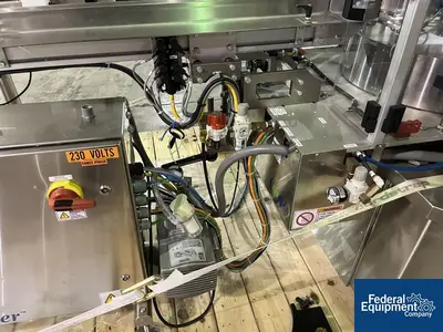 USED Quadrel Quadrel Wrap Around Labeler, Model Rotary
