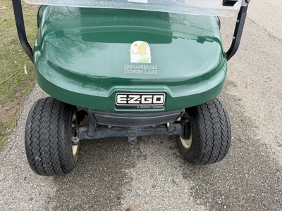 (1) 2015 E-Z-Go golf cart with a Kawasaki gas engine, does not include Club canopy, includes ball wa...