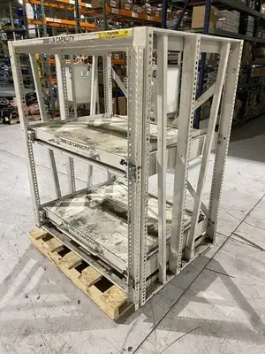 USED PROPER STORAGE SYSTEMS MANUAL ROLL OUT STORAGE DIE SHELVING