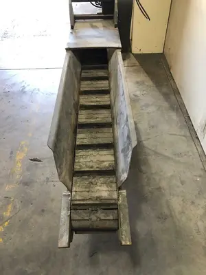 Metal Chip or Scrap Conveyor With Cleated steel belt 7.5" X 7'