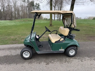 (1) 2015 E-Z-Go golf cart with a Kawasaki gas engine, includes Club canopy and ball washer, fold-dow...
