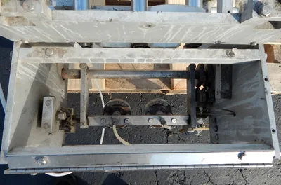 USED LID MAGAZINE PLACER 48 INCH LONG