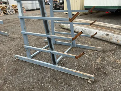 Metal 8-Tier Cantilever Rack, welded together, arms stick out approx. 20” and have metal brackets th...