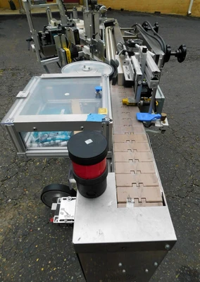 USED NEWMAN WRAP AROUND LABELER NV II