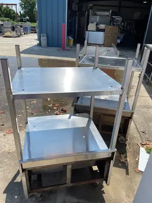 Used Pro Stainless Inc Used Stainless Commercial Equipment Double Oven Stand Stack with Caster Wheels - SS86 Oven Cabinets Illinois US | Falcon Restaurant Supply #1376128