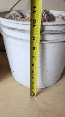 Buckets of Used Cast Iron Pipe Clamps with Bags