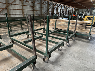 6 strand, 120' green chain with incoming deck and hoist. 24 heavy duty carts