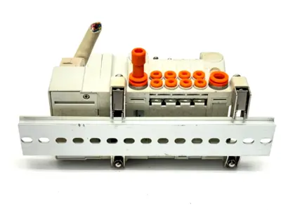 VV5QC11-04N3FD0-S | SMC  Base Mount Plug-In Manifold w/ DIN Rail Brackets - Used
