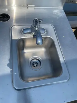 Used Duke Used 48" Duke Stainless Steel Work Counter with Sink and storage - SS245 Food Prep Tables Illinois US | Falcon Restaurant Supply #1375963