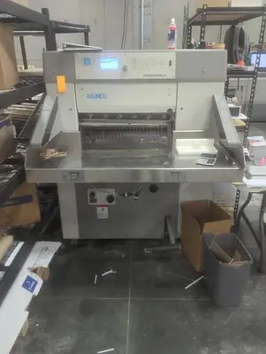 USED 2007 BAUMCUT 66 26.4” PROGRAMMABLE PAPER CUTTER
