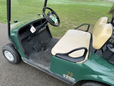 (1) 2015 E-Z-Go golf cart with a Kawasaki gas engine, includes Club Clear club and ball washer, does...