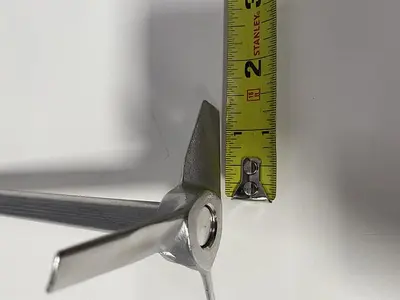 USED 8" L STAINLESS STEEL IMPELLER ROD W/ 1/2" DIAMETER SHAFT & 3 1/4" IMPELLER