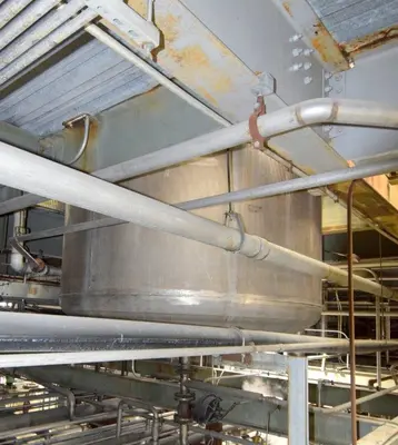 Mason Steel Tank, Approximately 2,500 Gallons, Stainless Steel, Vertical.