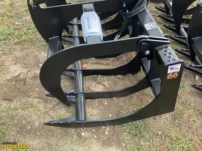 New Tomahawk 66” brush grapple attachment, two hydraulic grapple arms, skid steer quick attach