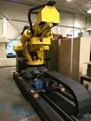 Used 2012 FANUC M900IB/700 6 AXIS CNC ROBOT WITH R30IB CONTROLLER  & 7TH AXIS 15' LONG TRACK. Robots | Harbor Machinery Inc. #1283286