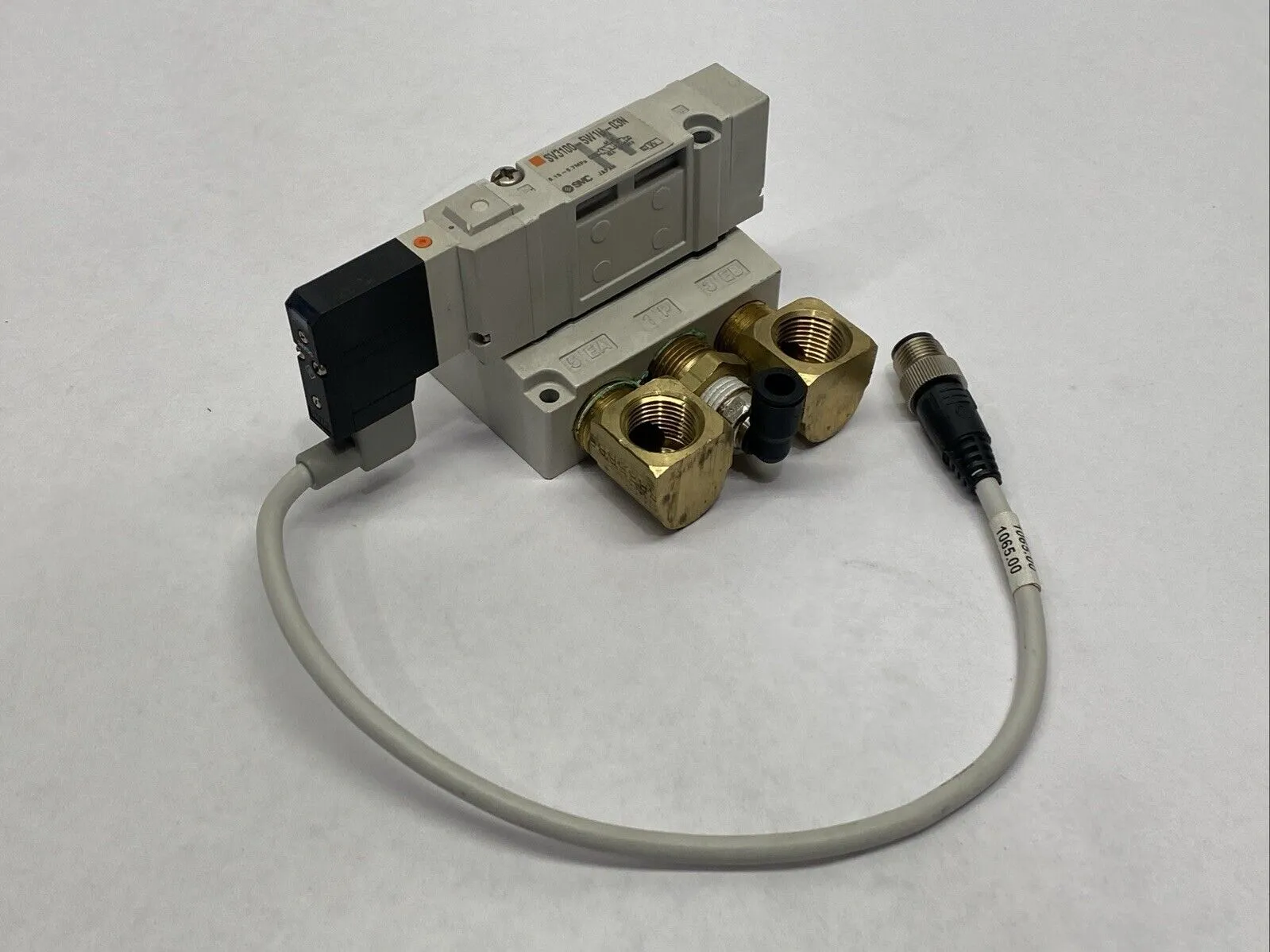 SV3100-5W1U-03N | SMC  Pneumatic Solenoid Valve w/ Subplate 24VDC - Used