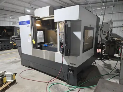 2018 Leadwell V-50i VMC w/ 30-Slot ATC, Conveyor, Kurt Vise, Fanuc Oi-MF Controller