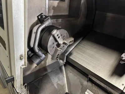 USED 2010 OKUMA GENOS L400E
