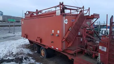 USED 28 M3 (180 BBL) SKID MOUNTED 2 COMPARTMENT MUD TANK