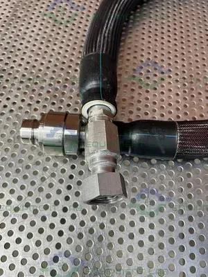 USED HUBER INSULATED CHILLER HOSE 53" W/ 1" FEMALE THREADED TO 1" QUICK DISCONNECT