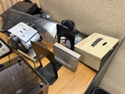 (1) 80" wooden desk with contents, includes paper shredder, paper organizers, Rolodex cards, coffee ...