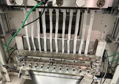 USED SANKO MODEL FC-1000 STICK PACK VERTICAL FORM FILL SEAL MACHINE WITH VOLUMETRIC FEEDER SANKO MODEL FC-1000 STICK PACK VERTICAL FORM FILL SEAL MACHINE WITH VOLUMETRIC FEEDER