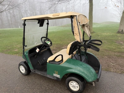 (1) 2017 E-Z-Go golf cart with a Kawasaki gas engine, model 625111G01, includes canopy, ball cover, ...
