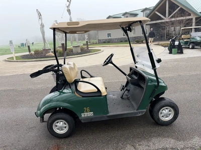 (1) 2015 E-Z-Go golf cart with a Kawasaki gas engine, does not include Club canopy, includes ball wa...