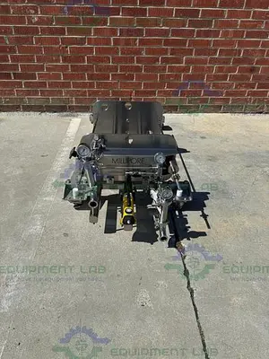 USED MILLIPORE MPOD SYS1B CP8PA5001A FILTER PRESS W/ ENERPAC P142 HYDRAULIC HAND PUMP