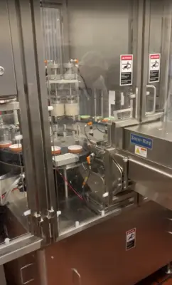 USED 2018 Modern Packaging Inc DR Rotary Filling and Sealer