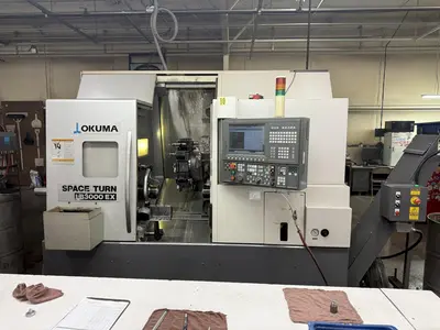 USED 2010 OKUMA LB3000EX-MWY/450