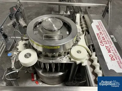 Unknown Rotary Capper, with Conveyor
