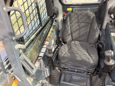 Used 2015 JOHN DEERE 326E WITH 1,162 HOURS Skid Steer Loaders Michigan US | Miedema Asset Management Group #1424758