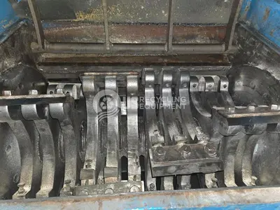 Unknown Manufacturer Used 150HP Granulator with Conveyor