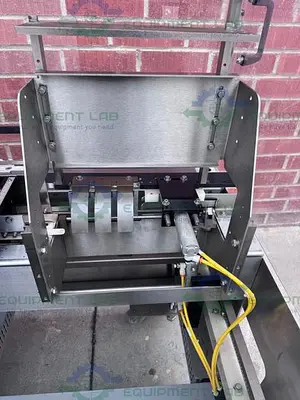 USED ECONOSEAL E SYSTEM 2000 ECONOSEAL CARTONER W/  HOT GLUE SEALING
