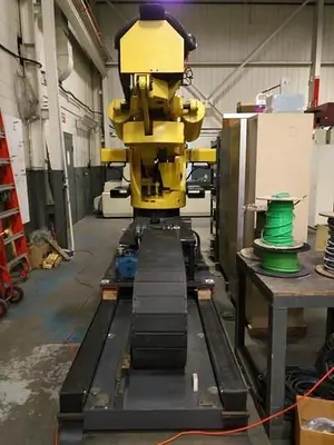 Used 2012 FANUC M900IB/700 6 AXIS CNC ROBOT WITH R30IB CONTROLLER  & 7TH AXIS 15' LONG TRACK. Robots | Harbor Machinery Inc. #1283286